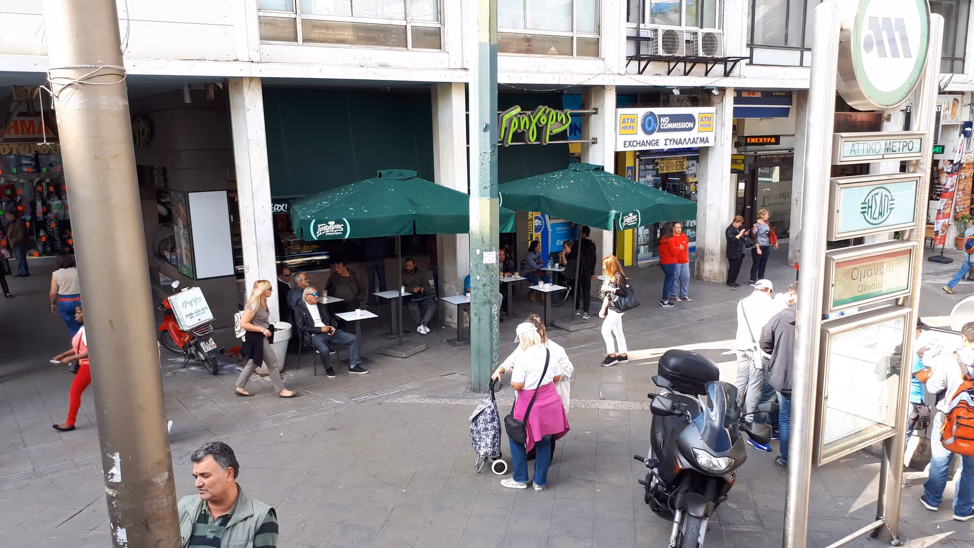 Omonia Square in central Athens showing the Bagkeion Mansion and surrounding urban streetscape